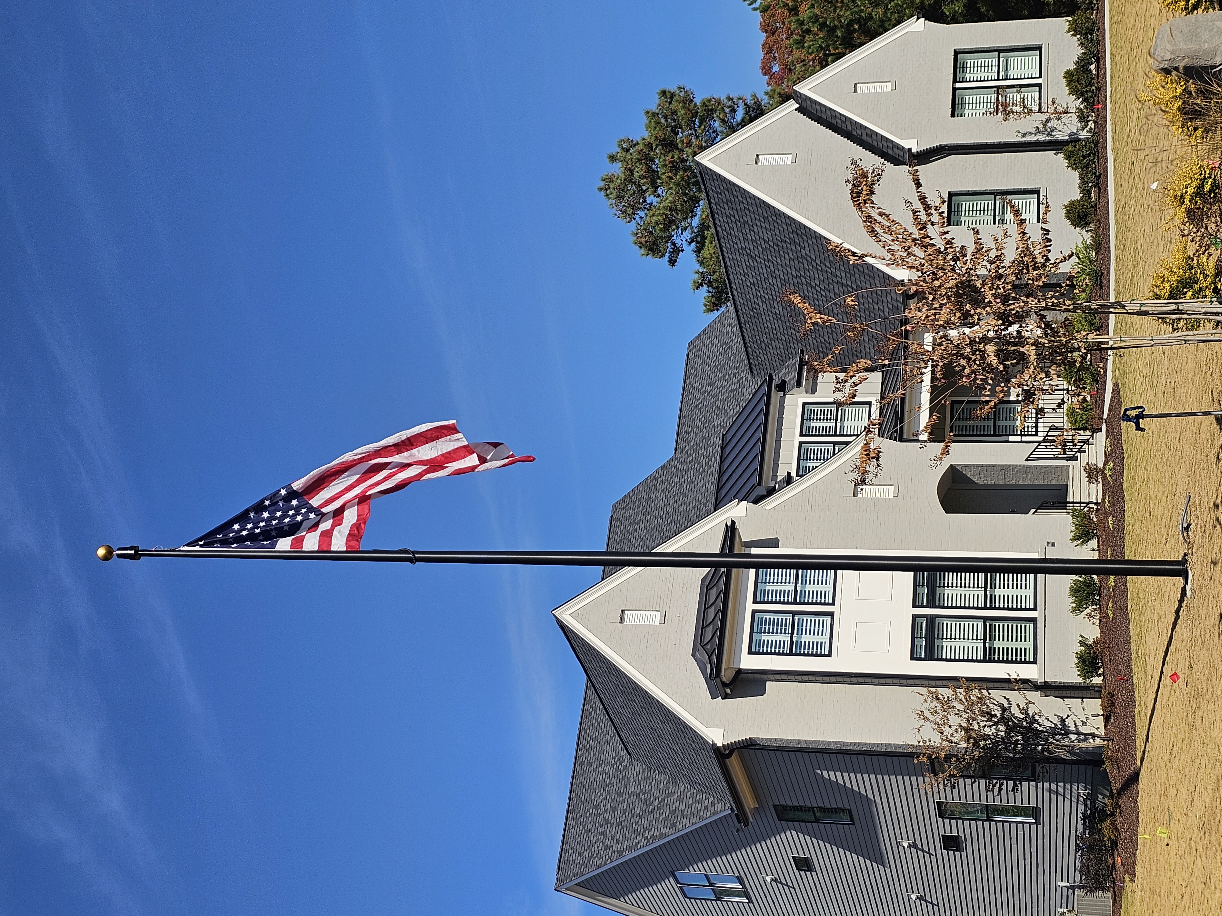 residential flagpole installation